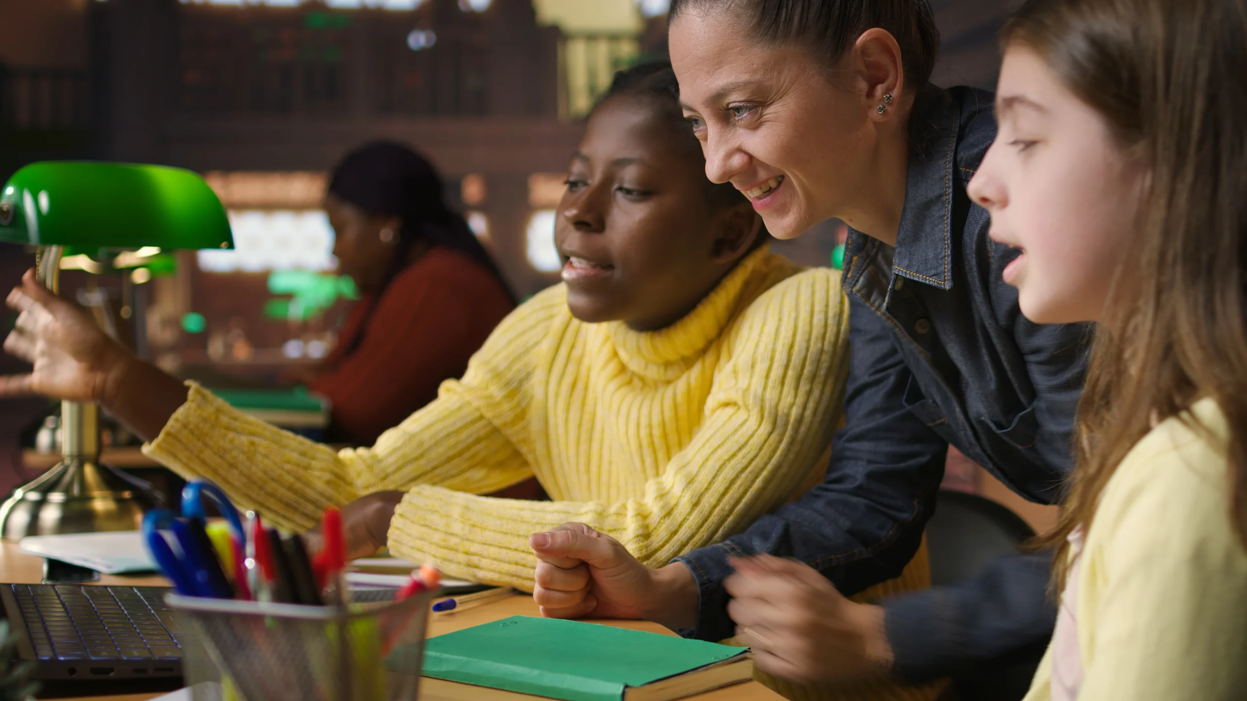 multiethnic-scholars-library-engaged-remote-learning-with-their-mentor