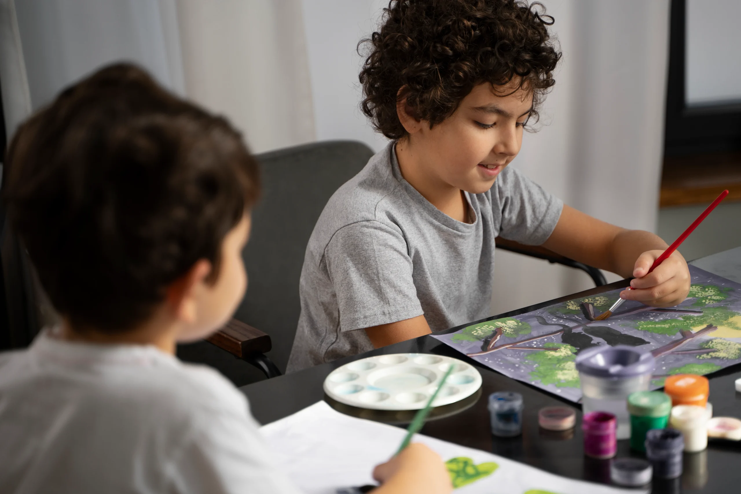 young-kids-painting-with-watercolor