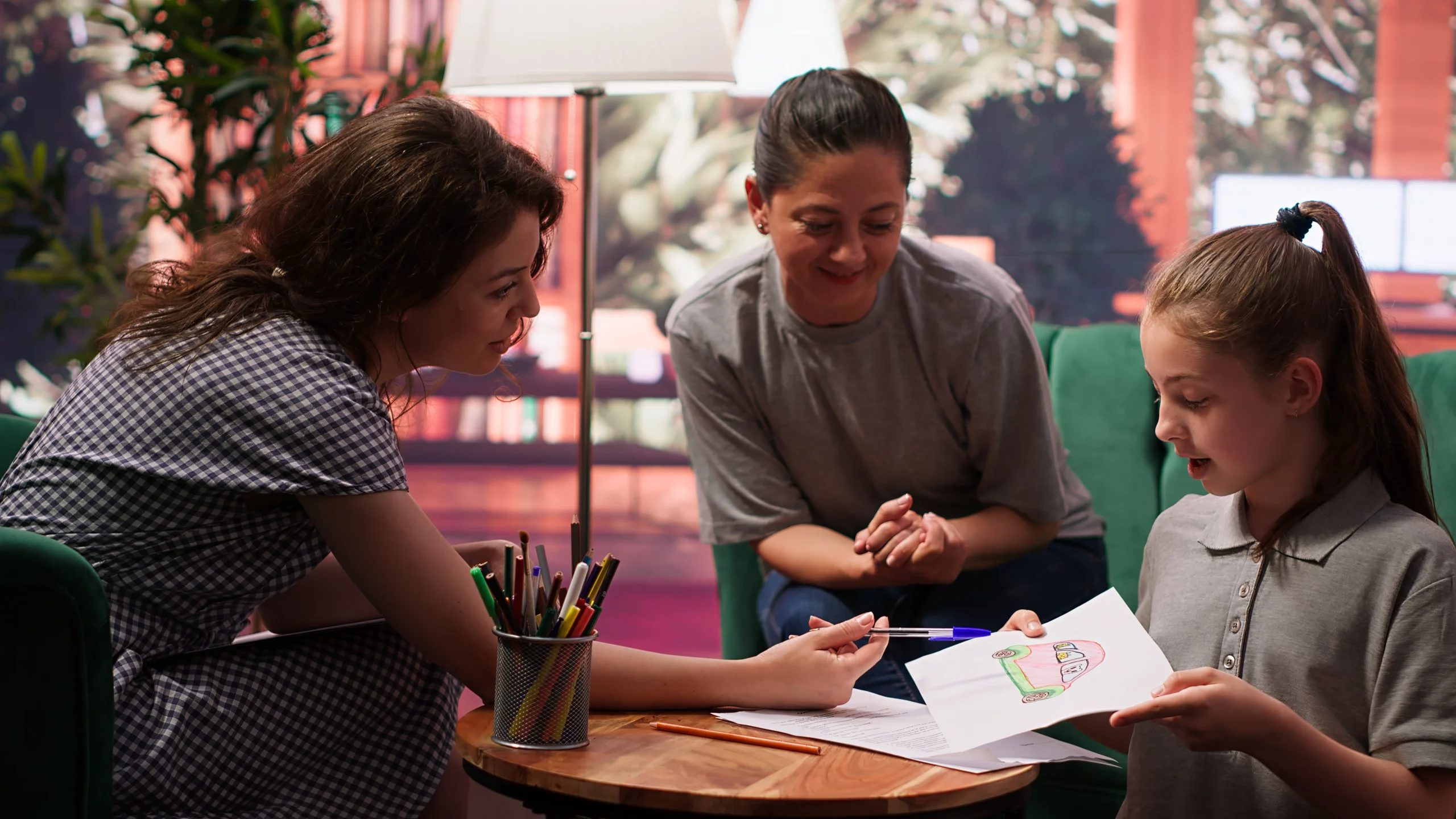 teen-girl-participates-drawing-activity-as-part-psychotherapy